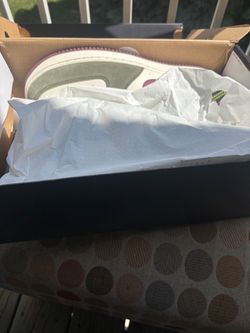 Sneakers in Box with Tissue Paper