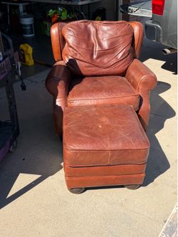 Leather seat and ottoman.