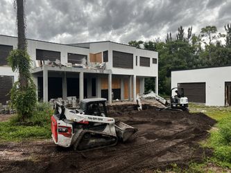 Excavadora Y Bobcact 