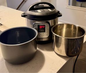 Instant Pot Duo Pressure Cooker with 2 Inner Pots – Stainless Steel & Nonstick
