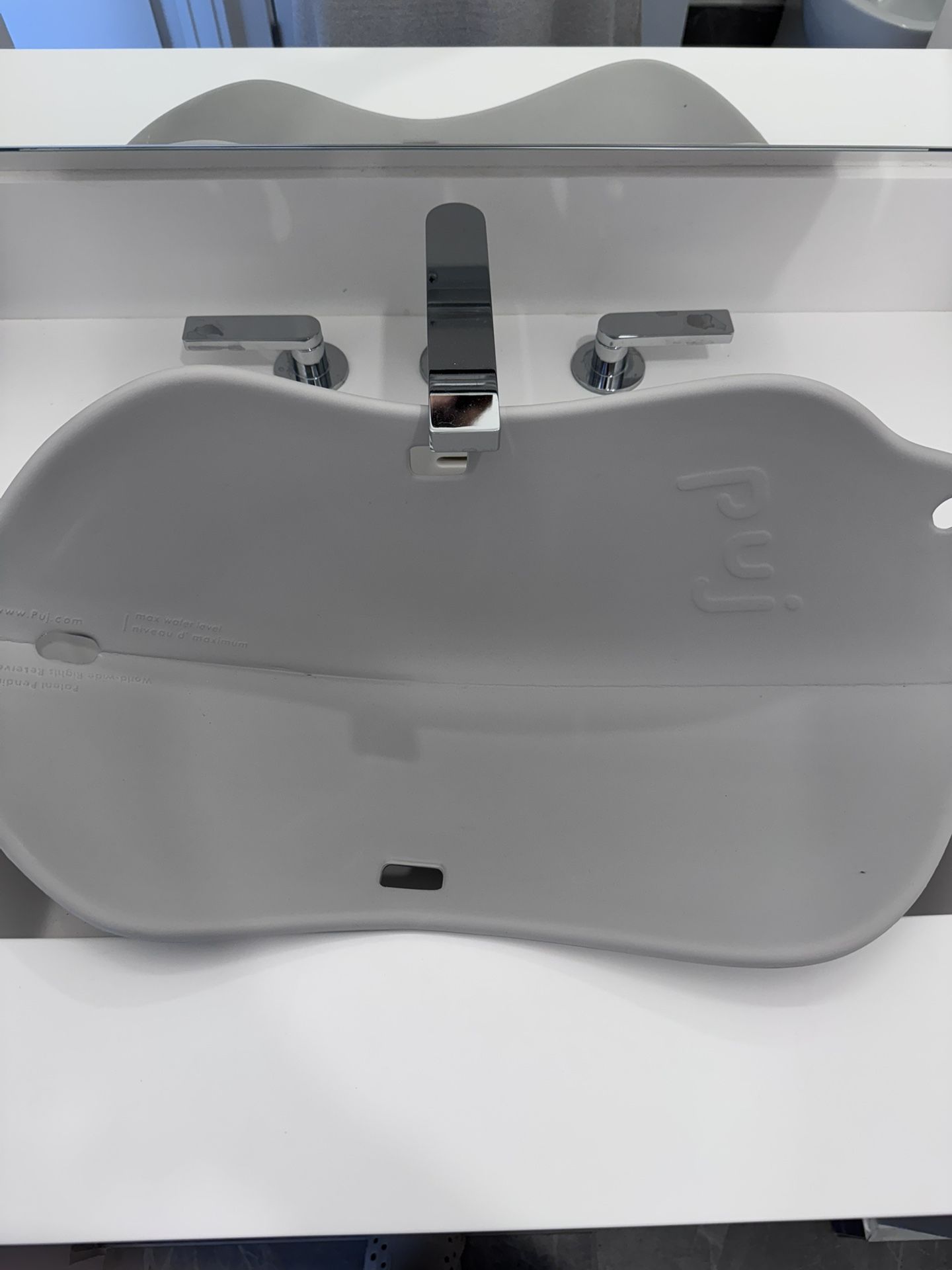 Puj – Puj Flyte Compact Infant Bathtub, Baby Bathtub for Newborns and Infants, Stylish Baby Bath Essentials for Home and Travel, 23.5 x 10.51 x 1.5 in