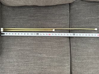 Free 18”-31” twist tension rods