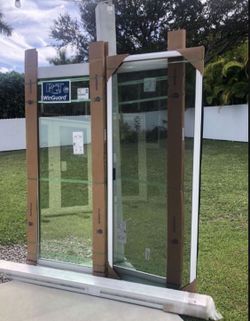 PGT Brand 61.25 X 79.25 Aluminum Impact Sliding Glass Door  XX