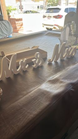 Mr. and Mrs. sign