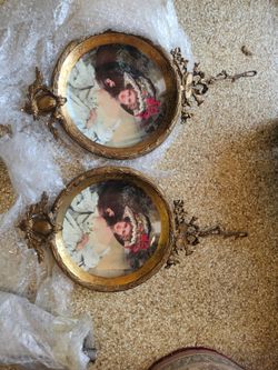 Pair of Ornate Gold Oval Portrait Frames