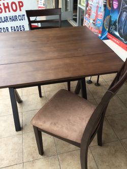 Brown dining table new with 2 chairs