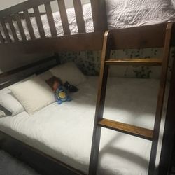 Wooden bunk bed twin/full with storage