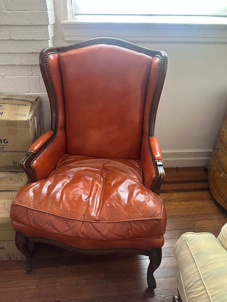 Orange genuine leather wingback chair