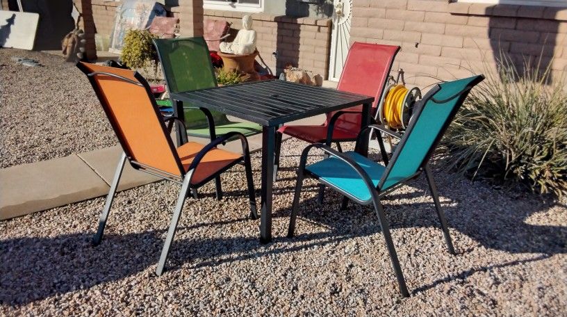 Patio Table And 4 Colorful Chairs