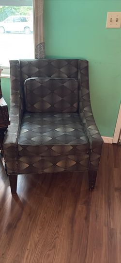 Patterned fabric accent chair with lumbar pillow