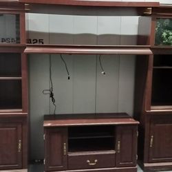 Wooden entertainment center with Specialty lighting accent lights