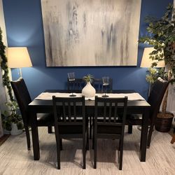 Table With 6 Chairs In Acceptable Condition! 