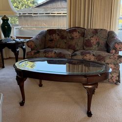 Burgundy and green love seat