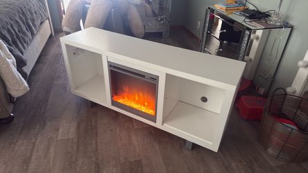 Entertainment center with fireplace