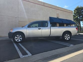 WORK TRUCK ,WORK TRUCK 
2008 Nissan titan FLEXFUEL
Runs very good
AC WORKS
NEW TIRES
Automatic 
Motor V8
scratches here and there ,but is a WORK TRUCK
