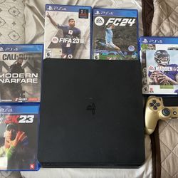 PS4 With Controller And Games
