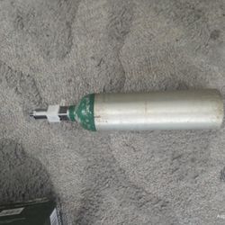  Oxygen Bottles And A Walker,Wheel Chair, And Hospital Bed 