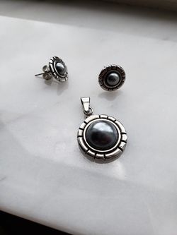 Earrings and necklace charm