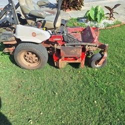 X mark Riding  lawnmower