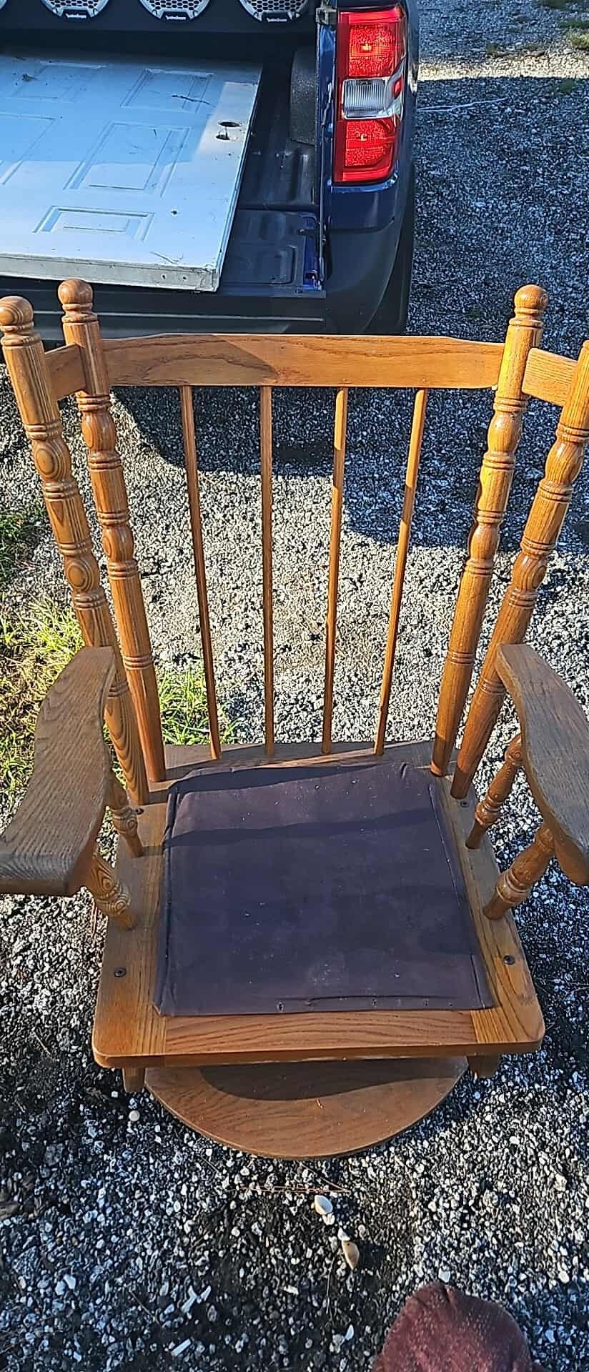 antique rocker real heavy wood in eccellant shape  cushion needs repair or replace