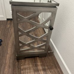 decorative mirrored cabinet door or accent table/cabinet door.