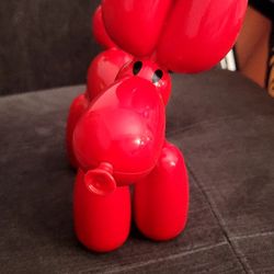 Introducing the playful and interactive Squeakee the Balloon Dog! This toy features a unique set of functions such as the ability to feed him, teach h