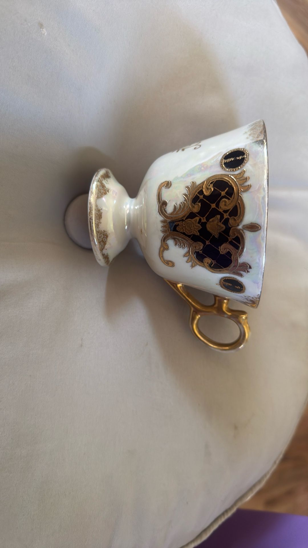 Vintage teacup with gold trim
