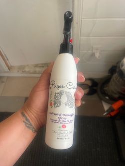 Rizos curls detangle spray