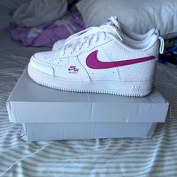 White/red Nike Air Force 1’s