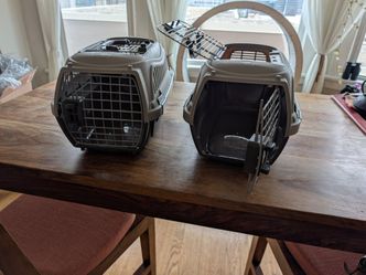 Two matching Whisker City cat carriers