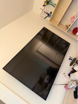 65 inch  TLC  Roku Tv