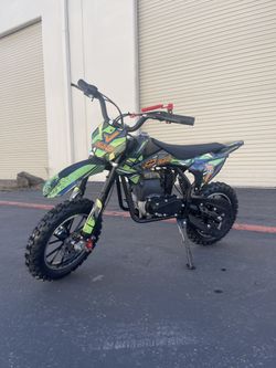 40cc 4-Stroke Gas Powered Kids Dirt Bike with Safety Kill Switch top speed about 20mph, mix weight 135lb