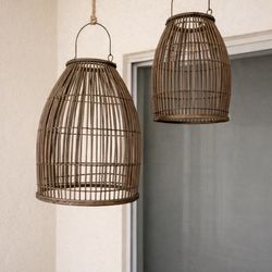 Authentic Pottery Barn woven rattan lanterns in excellent condition