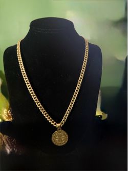 14K Cuban chain 24” 29g + 5.4g 10k religious pendant