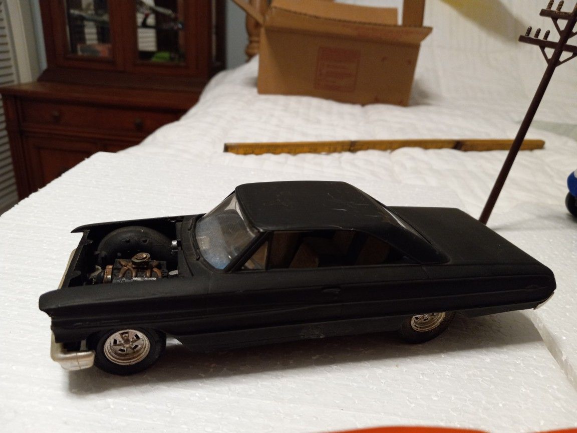 2 1960s Chevy Impalas Built Model Kits