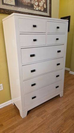 Clean and Sturdy 8-Drawer Tall Dresser.