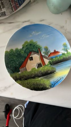 Hand painted houseboat on the water