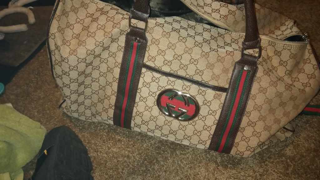 Gucci Travel/Luggage bag