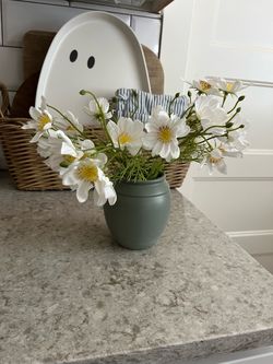 Faux flower arrangement $10