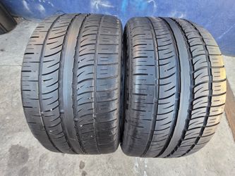 2 USED TIRES PIRELLI 285/35/22