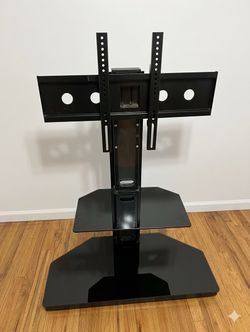$70 OBO. Black Glass TV Stand with Integrated Swivel Mount