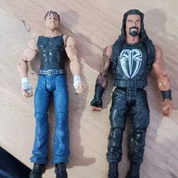 Roman Reigns and Dean Ambrose action figures 