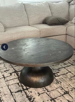 Round Dark Wood Pedestal Coffee Table