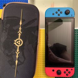 Nentendo switch. Case. 2 Games. Charger  