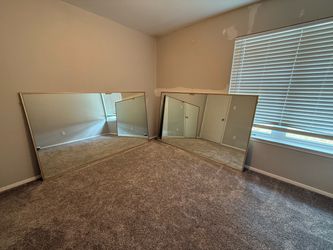 Large Mirror Doors for Closet with Gold Color Trim