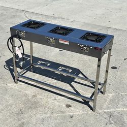 parrilla de tres quemadores de gas propano