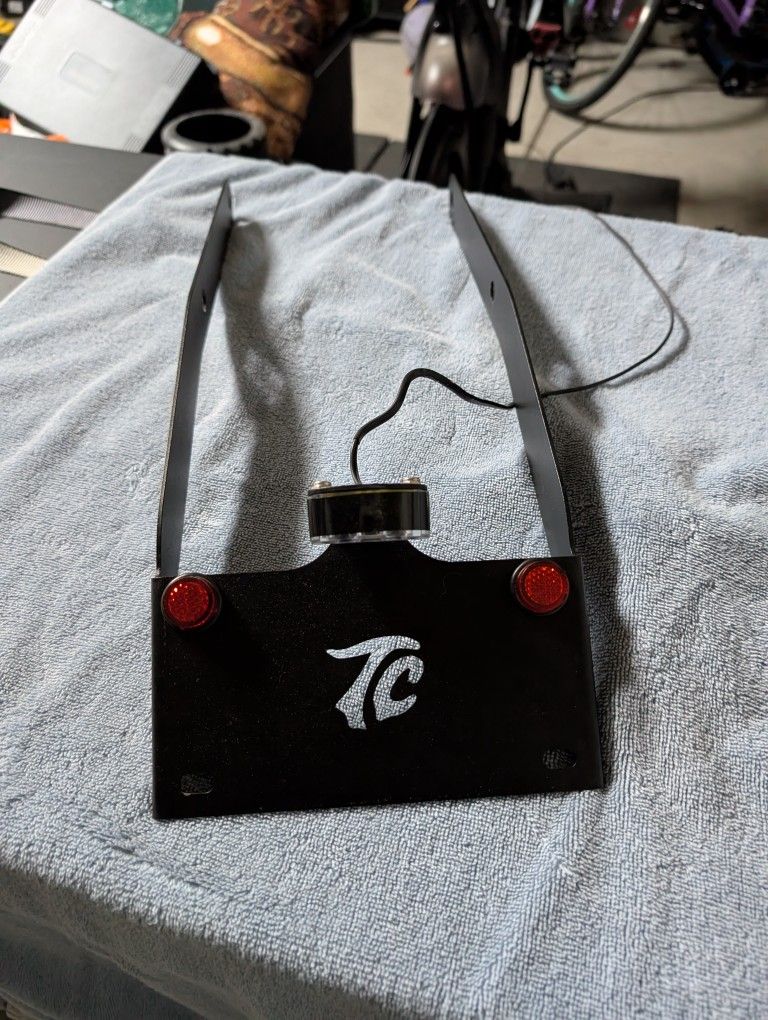 TC bros License Plate Relocation