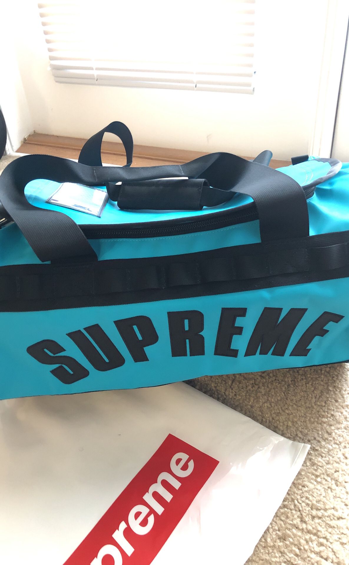 Supreme x The North Face duffle bag
