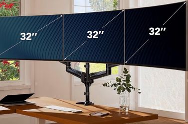 3 monitor adjustable ***price drop••• swivel mount. Home office