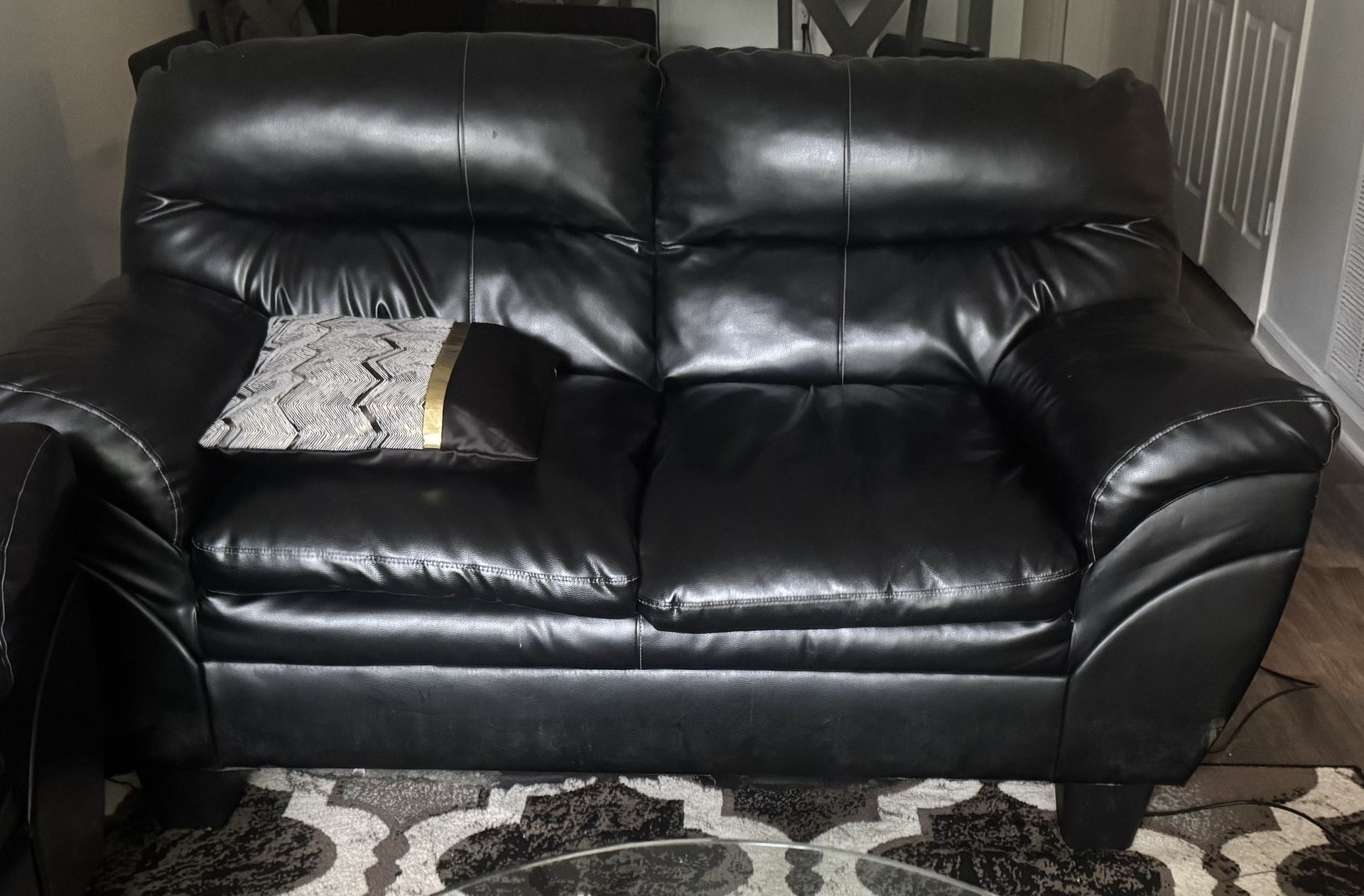 Black Leather couch and loveseat
